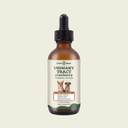 Carls Bom Urinary Tract Cranberry Treatment For Dog in an amber glass dropper bottle with a black cap and white label, centered on a light beige background.